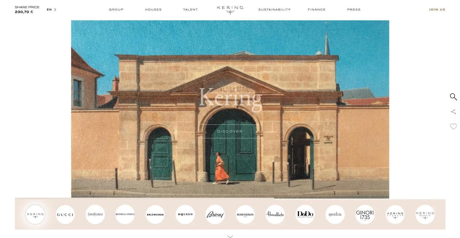 kering homepage Kering website homepage featuring a historic building and a woman in an orange dress walking by.