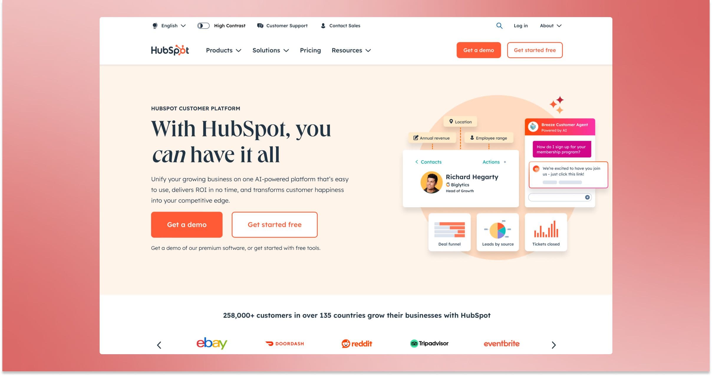 HubSpot homepage showcasing customer platform features, demo options, and client logos on a soft gradient background.