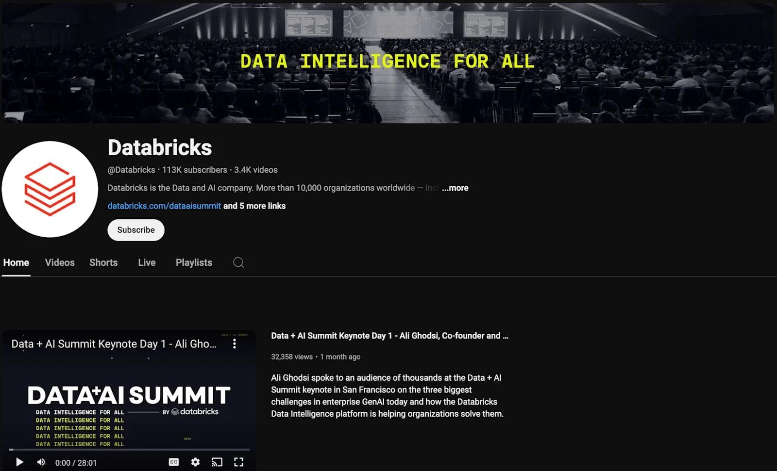 databricks-youtube Databricks YouTube channel featuring a packed audience at the Data + AI Summit, focusing on data intelligence.