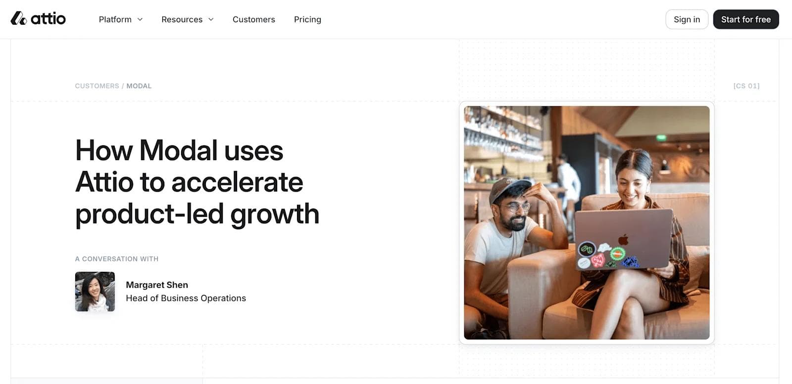 attio case study A woman and a man engage with a laptop in a casual café setting, focused on a discussion.